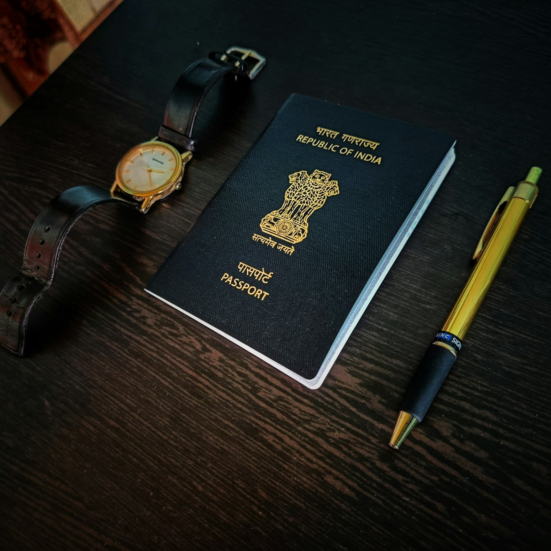 Indian passport cover on a desk